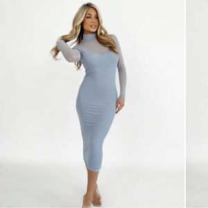 The soft, stretchy material creates a flattering bodycon fit!